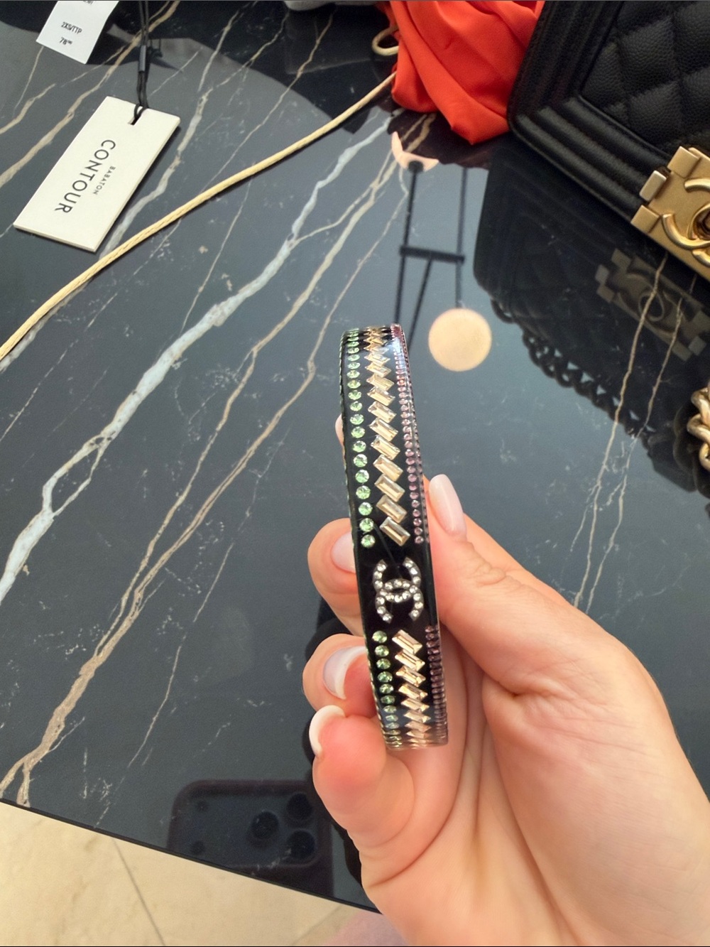 Chanel Crystal-Embellished Black Bracelet with Green Accents. A s